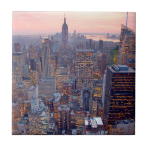 Vista larga de Manhattan no por do sol
