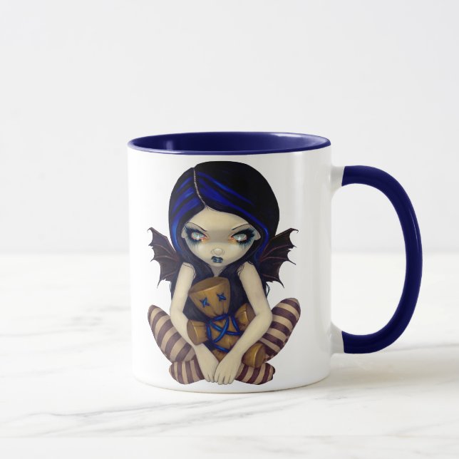 "Voodoo" na caneca azul (Direita)
