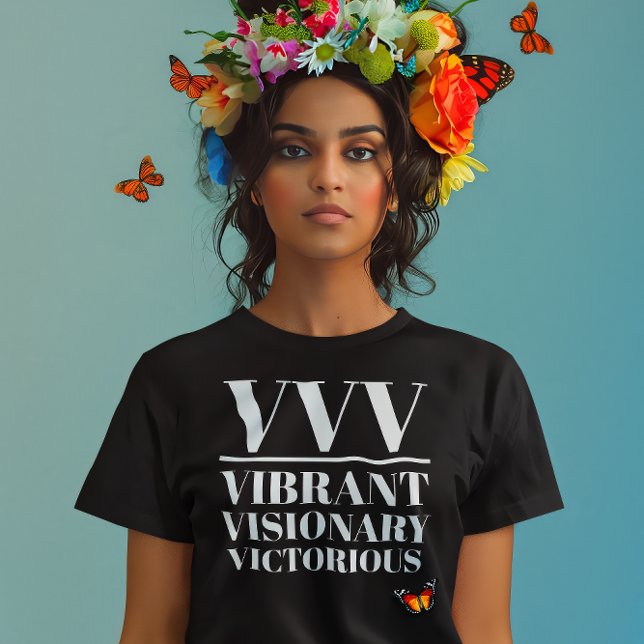 VVV- Vibrante, Visionário, Vitorioso (Young indian woman wears a "VVV: Vibrant, Visionary, Victorius" black t-shirt.)