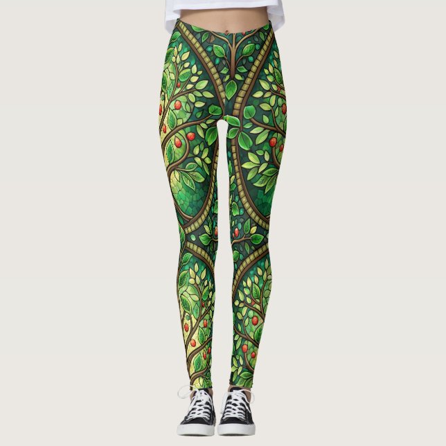 Woman wearing vibrant leggings with an intricate  (Frente)