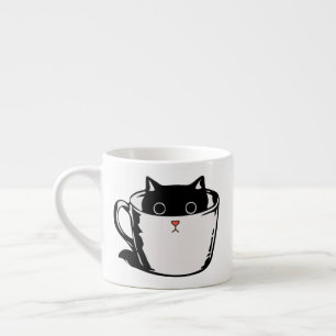 Xícara De Espresso Gato preto com nariz vermelho escondido em um copo